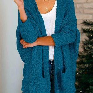New in packaging teal blue cardigan